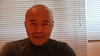 Dr Maurice Tran Dinh